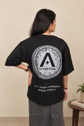 Attention Currency oversized tee in Black, back print